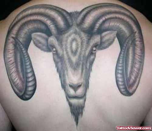 Grey Ink Aries Head Tattoo On Back