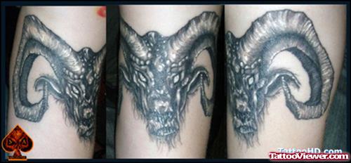 Grey Ink Aries Tattoo On Bicep