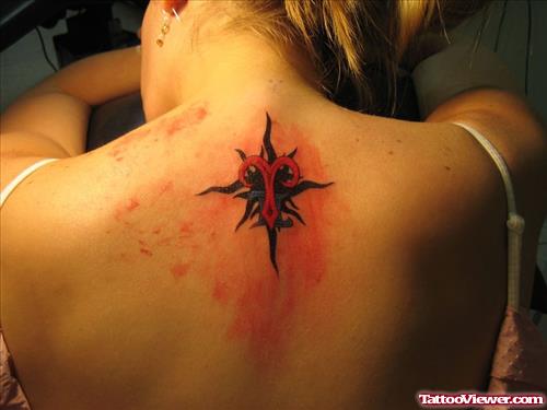 Tribal Sun Zodiac Gemini And Aries Tattoo On Back