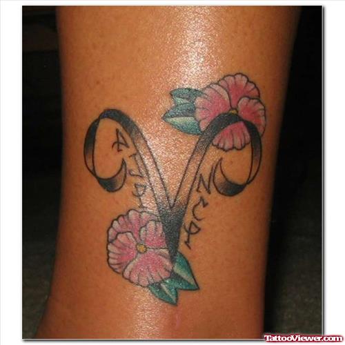 Flowers And Memorial Aries Tattoo