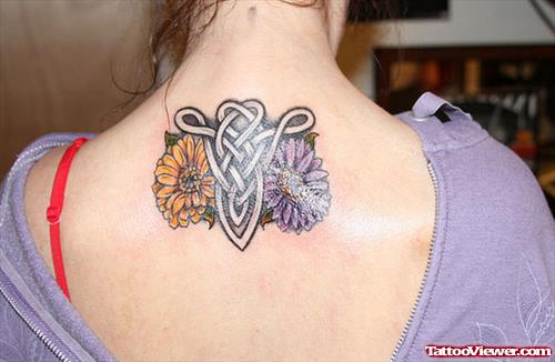 Flowers And Celtic Aries Tattoo On Back