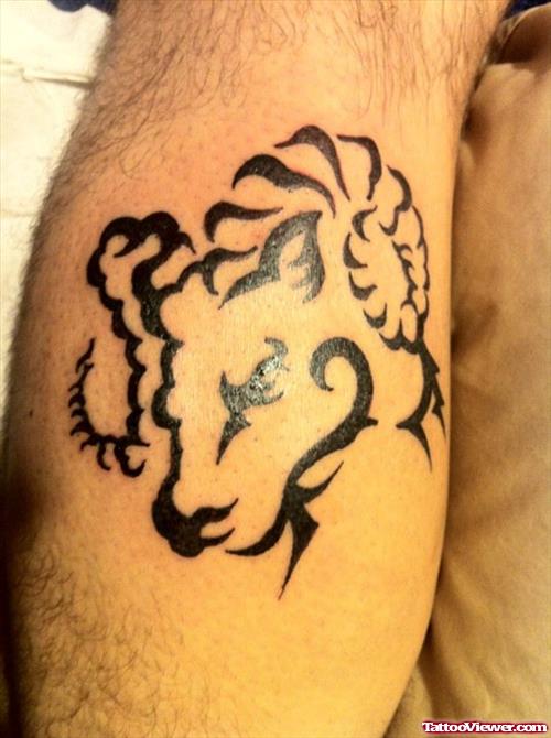 Black Ink Tribal Aries Head Tattoo On Leg
