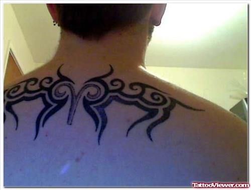 Tribal And Zodiac Aries Tattoo On Upperback