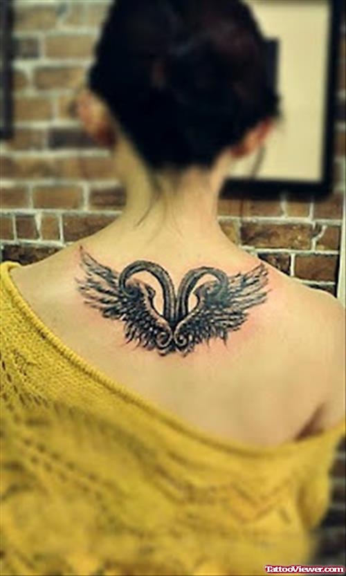 Girl Upperback Winged Aries Tattoo