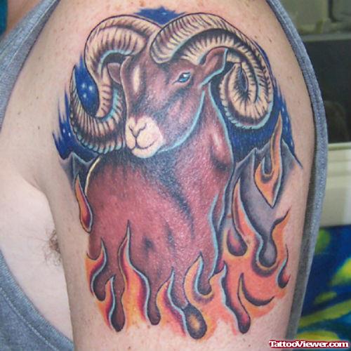 Flaming Aries Tattoo On Left Shoulder