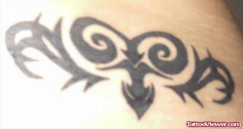 Black Ink Tribal And Aries Tattoo