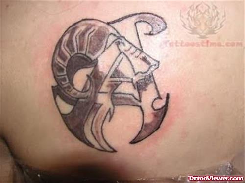 Aries Symbol Tattoo On Back