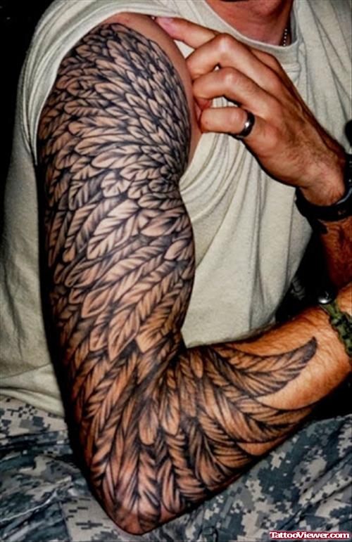 Grey Ink Feathers Tattoos On Right Arm