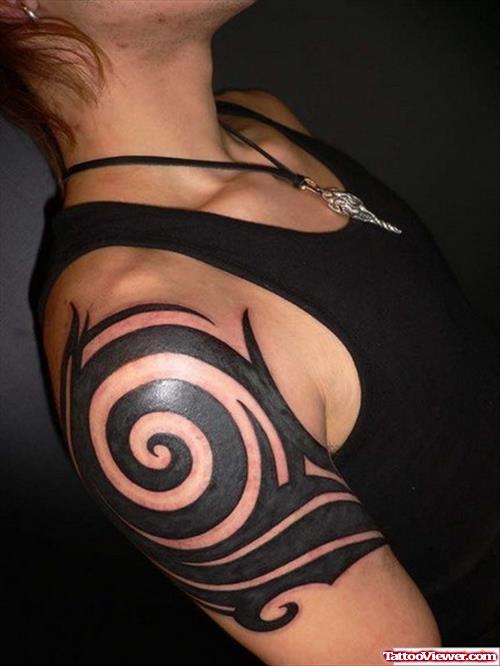 Black Tribal Right Arm Tattoo