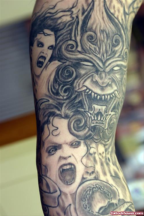 Grey Ink Evil Tattoo On Right Arm