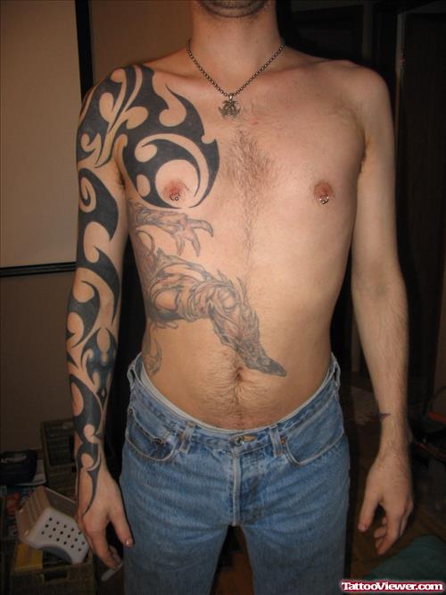 Classic Black Ink Tribal Tattoo On Man Right Arm