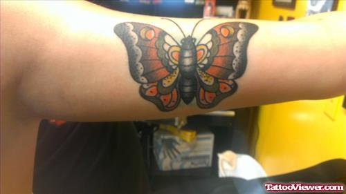 Colored Butterfly Tattoo On Arm