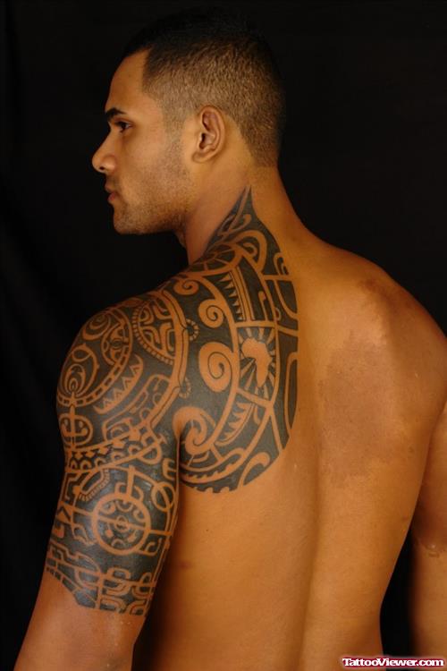 Stylish Black Ink Tribal Tattoo On Man Left Arm