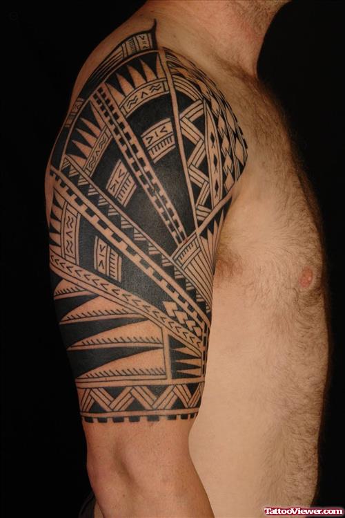 Polynesian Tattoo On Man Right Arm