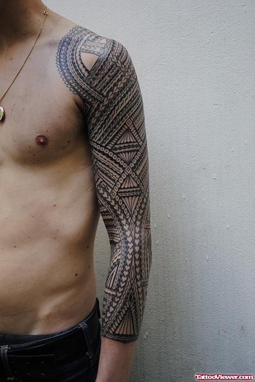 Grey Ink Polynesian Tattoo On Left Arm