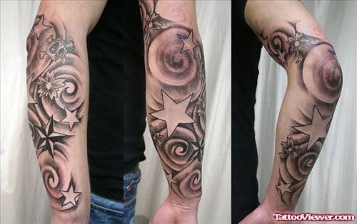 Grey Ink Nautical Star Tattoo On Arm