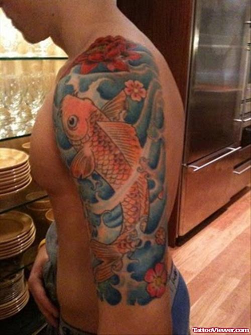 Colored Flower And Koi Tattoo On Left Arm