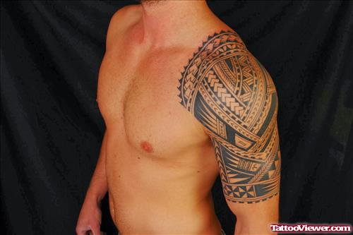 Samoan Tattoo On Man Left Arm