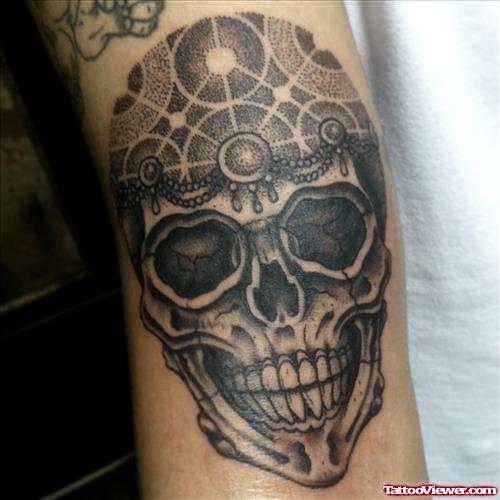 Grey Ink Skull Tattoo On Arm