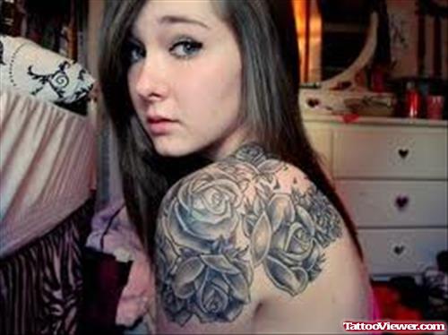 Grey Ink Flowers Tattoos On Left Shoulder