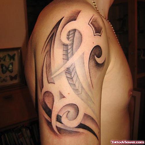 Amazing Grey Ink Tribal Arm Tattoo