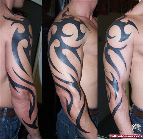 New Black Ink Tribal Tattoo On Man Right Arm