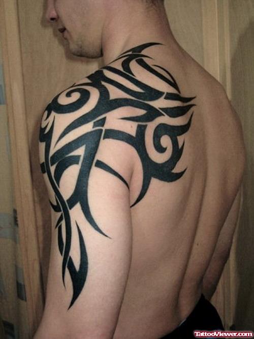 Man Left Arm Tribal Tattoo