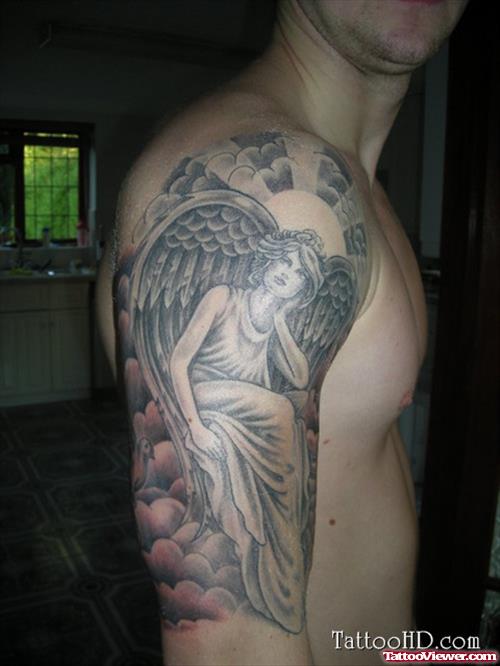 Grey Ink Angel Tattoo On Man Right Arm