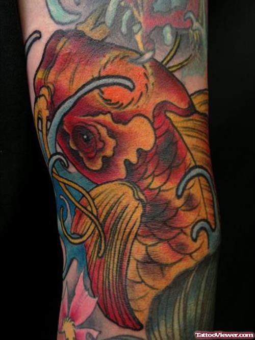Attractive Colored Koi Arm Tattoo