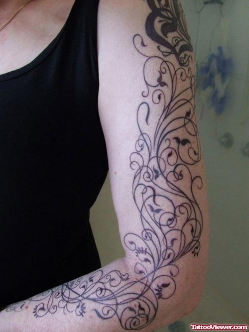Swirl Tattoo On Girl Left Arm