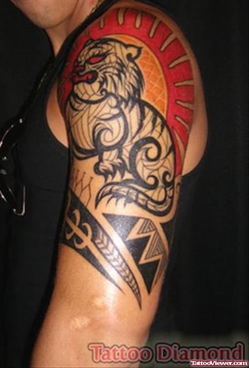 Attractive Black Ink Tribal Left Arm Tattoo