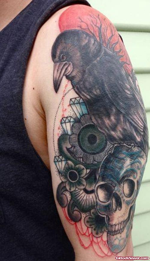 Skull And Crow Tattoo On Left Arm