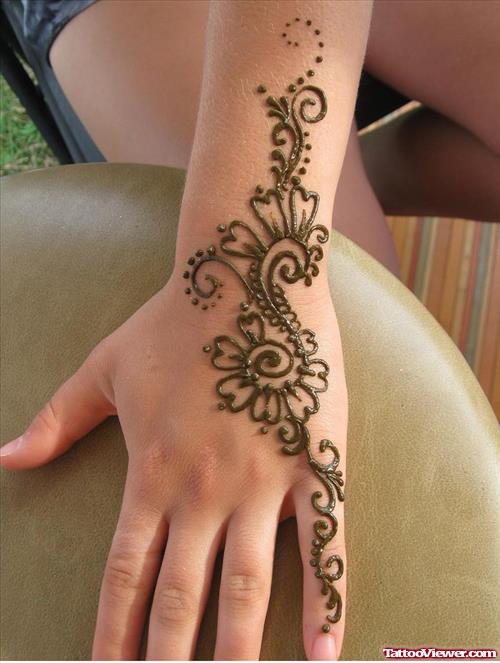 Henna Tattoo On Hand and Left Arm