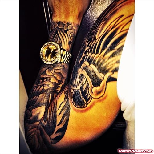 Jusin Beiber Left Arm Tattoo