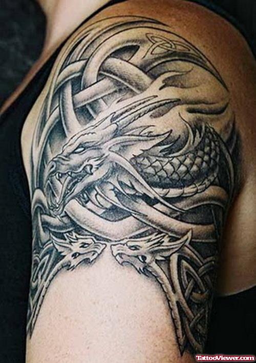 Grey Ink Tribal And Dragon Arm Tattoos