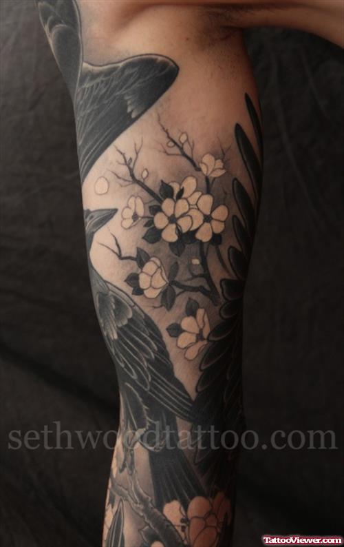 Grey Ink Flowers Tattoo On Right Arm