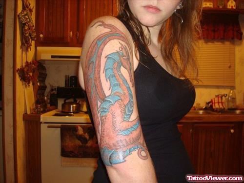Colored Dragon Tattoo On Girl Right Arm