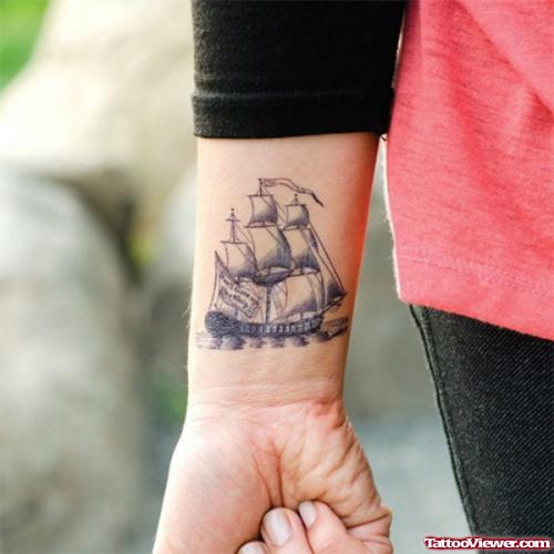 Grey Ink Ship Tattoo On Right Arm