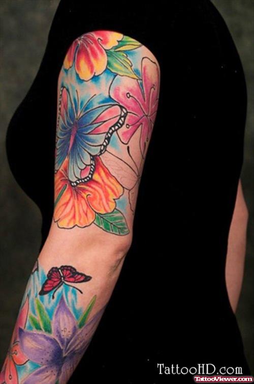 Colored Flowers And Butterfly Tattoo On Arm