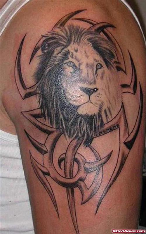Grey Ink Tribal And Lion Head Tattoo On Left Half Sleeve
