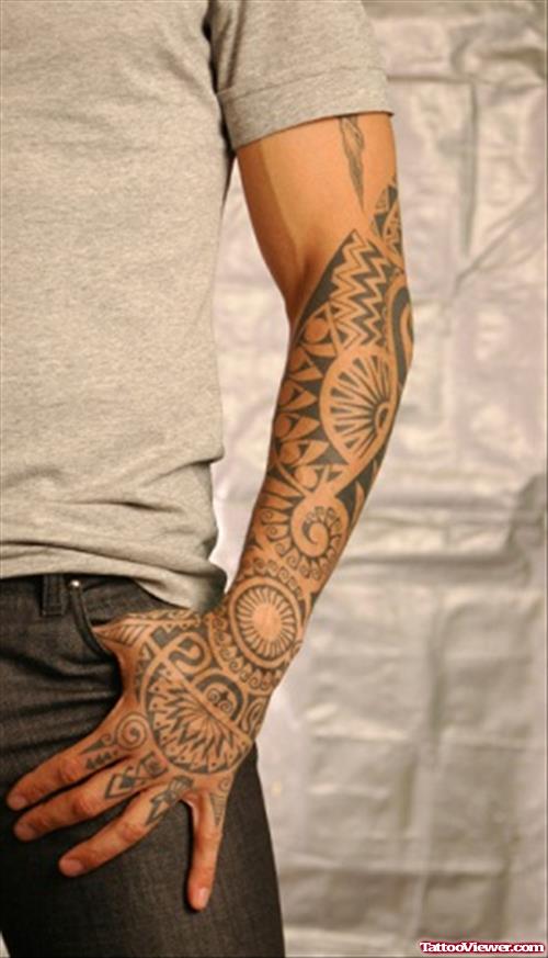 Cool Black Ink Tribal Left Arm Tattoo