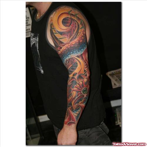 Awesome Colored Biomechanical Arm Tattoo