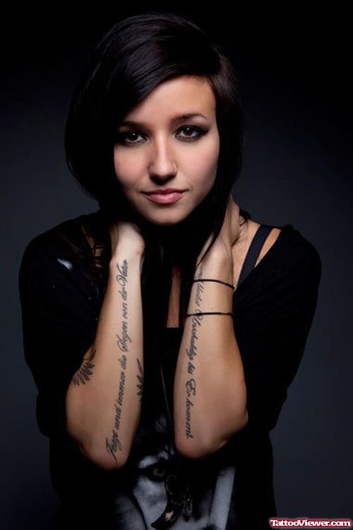 Girl Showing Her Lettering Arm Tattoos