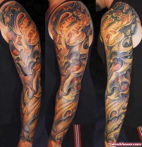 Awesome Color Tribal Tattoos On Left Arm