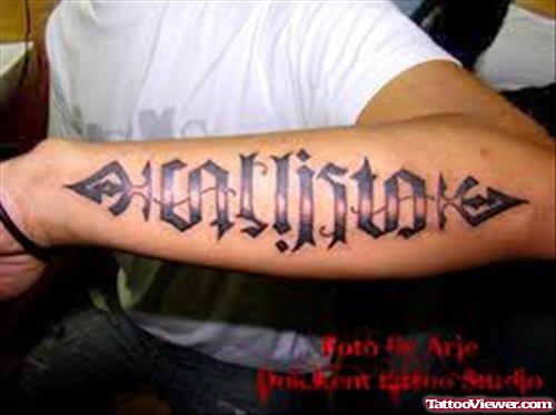 Ambigram Tattoo On Left Arm