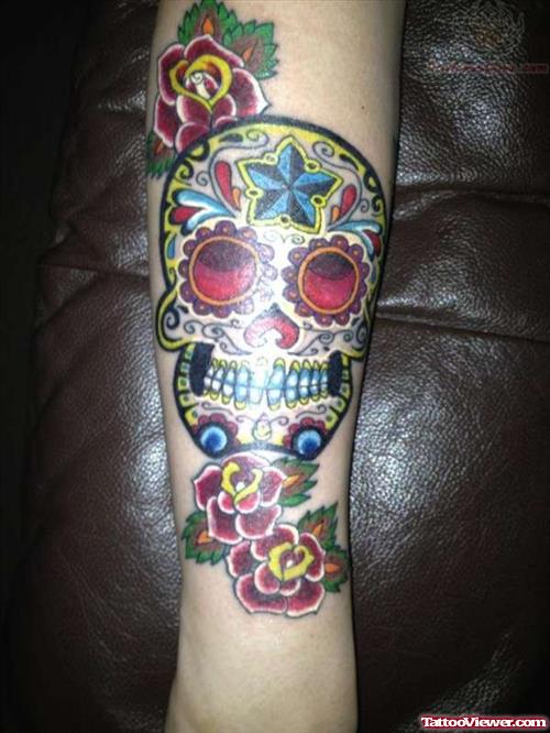 Flowers And Sugar Skull Tattoo On Arm