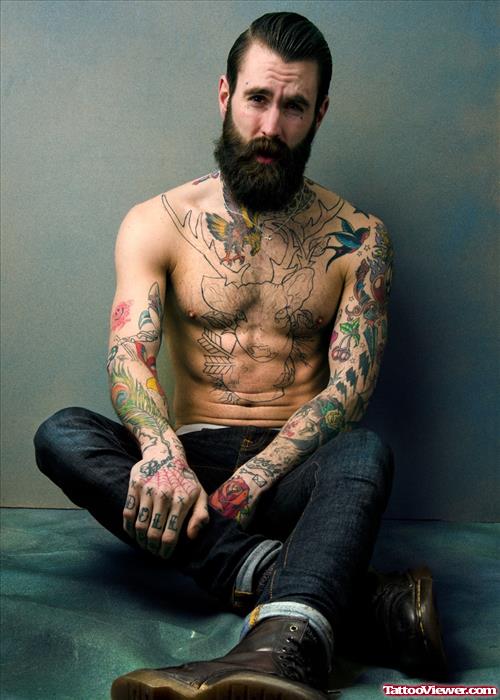 Colored Tattoos On Man Both Arms