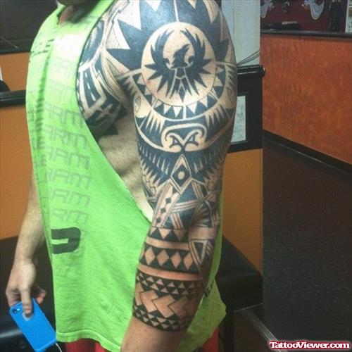 Awesome Black Ink Tribal Tattoo On Left Sleeve