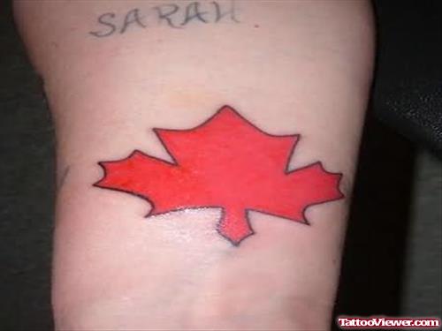 International Flag Symbol Tattoo On Arm