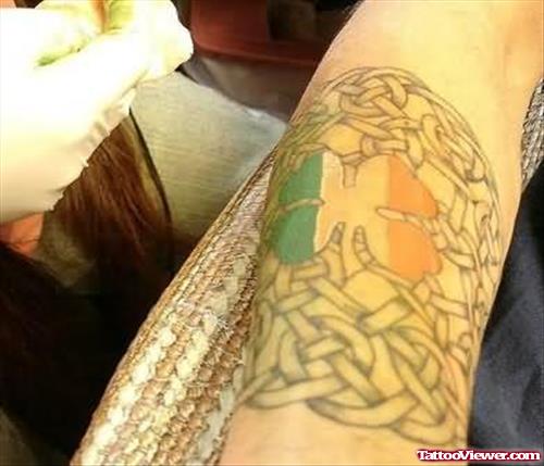 Flag Knot Tattoo On Arm